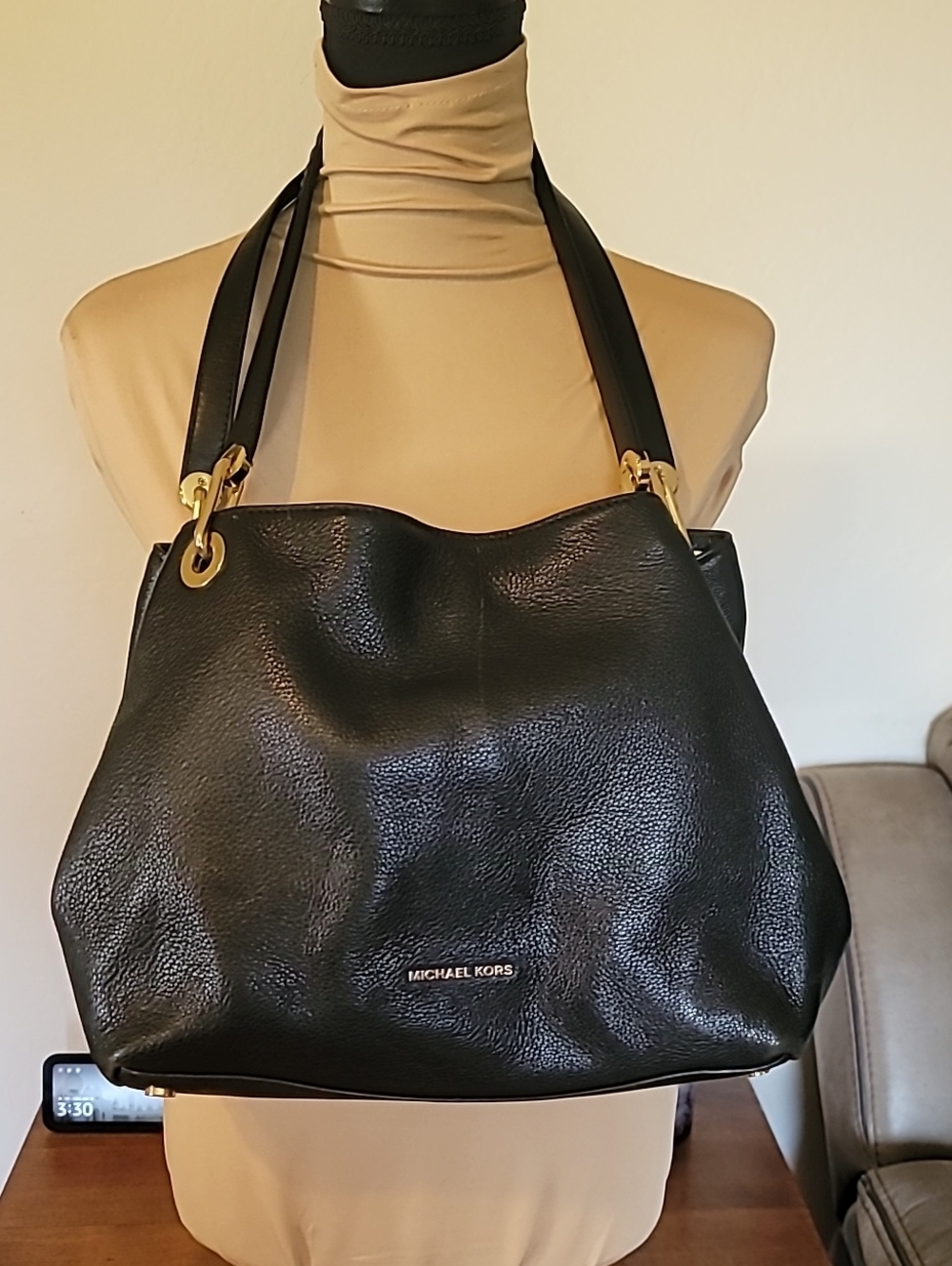 Michael Kors Black Pebbled Leather Shoulder Bag with Gold Hardware.